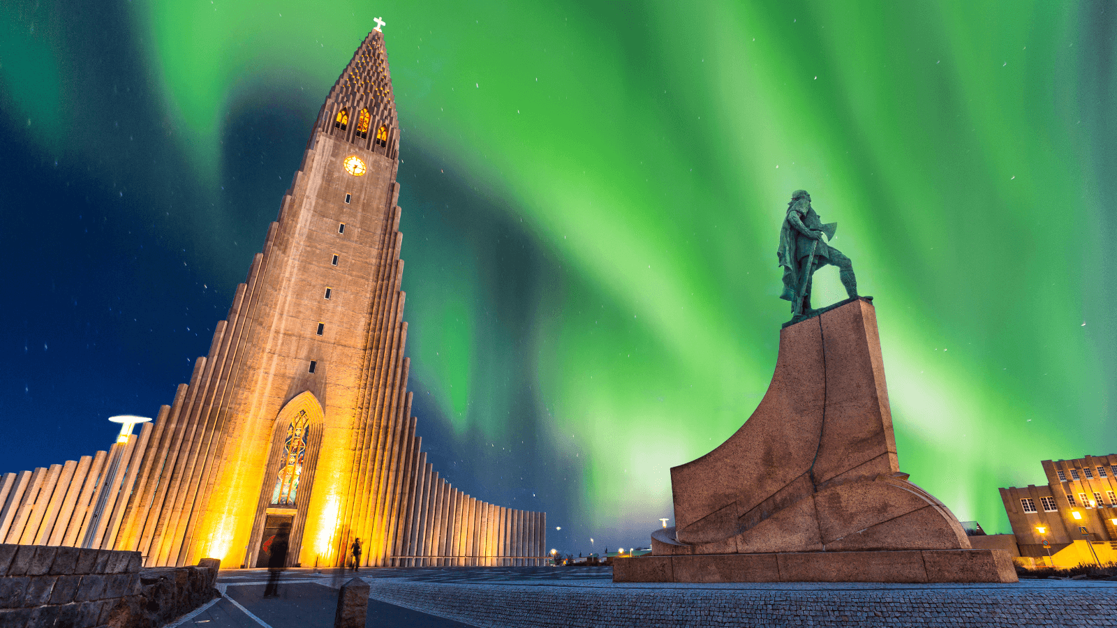 A view of Reykjavík’s Hallgrimskirkja church against the Northern Lights. 