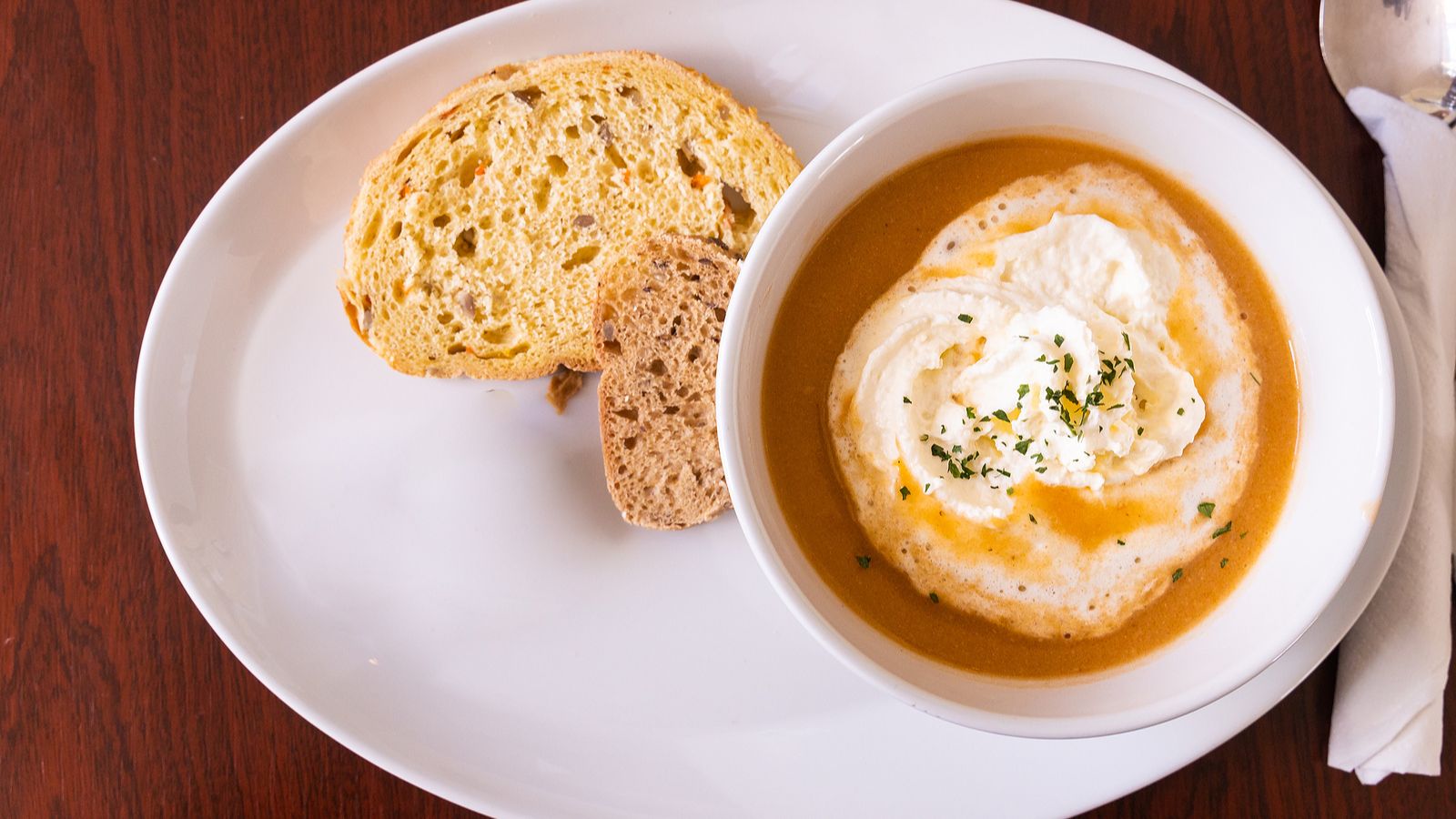 Icelandic lobster soup with a side of fresh bread.