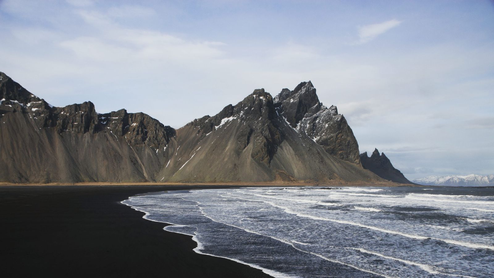 Panoramic view of the black sand beach at Stokksnes with Vestrahorn mountain near Höfn overlooking it.