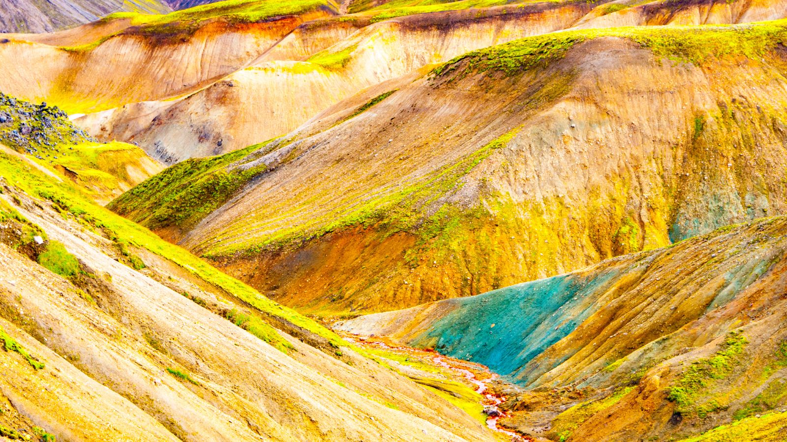 The start of the Laugavegur Trail showing the colorful Landmannalaugar mountains in Iceland.