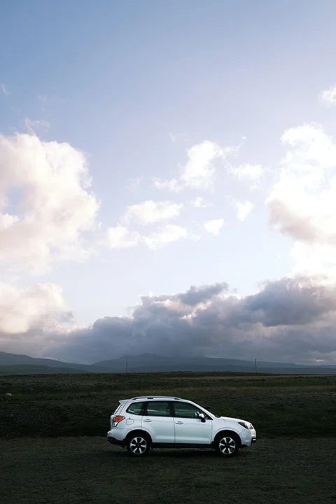 A car surrounded by Icelandic nature